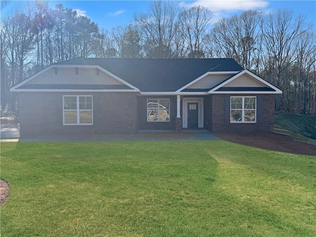 single story home featuring a front yard