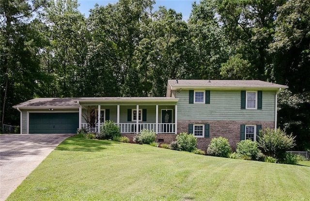 3359 Villa Ln, Douglasville, GA 30135 - split level home with covered porch, a garage, driveway, a front yard, and brick siding