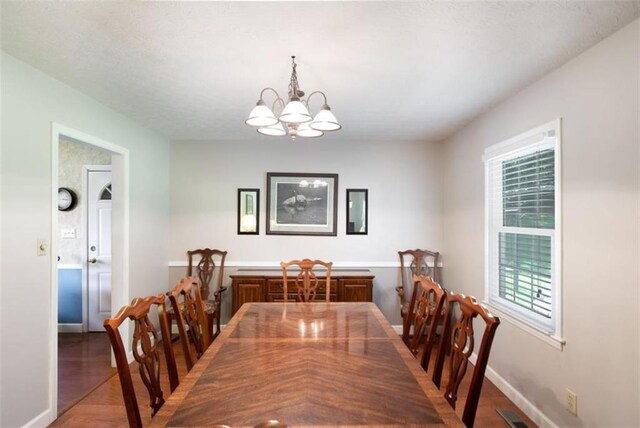 3359 Villa Ln, Douglasville, GA 30135 - dining area featuring a chandelier and wood finished floors