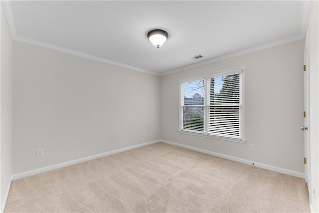 empty room with visible vents, light carpet, baseboards, and ornamental molding