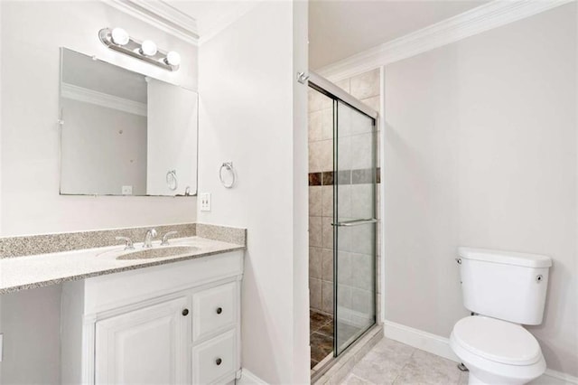 bathroom featuring vanity, tile patterned flooring, toilet, ornamental molding, and walk in shower