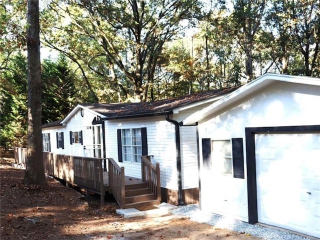 576 Nichols Rd, Pendergrass, GA 30567 - view of home's exterior with a wooden deck