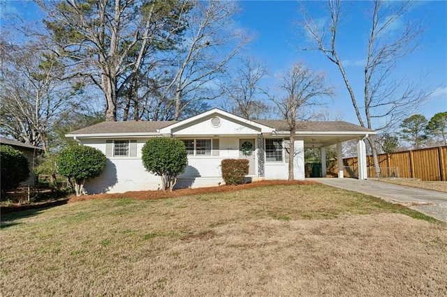 single story home featuring a carport and a front yard