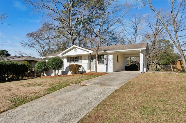 single story home with a front yard and a carport