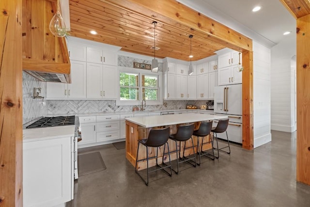 441 Pumpkinvine Rd, Acworth, GA 30101 - kitchen featuring a kitchen island, finished concrete floors, light countertops, high end white refrigerator, and a sink