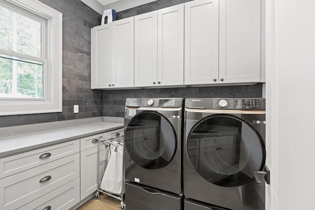 441 Pumpkinvine Rd, Acworth, GA 30101 - washroom featuring cabinet space and independent washer and dryer