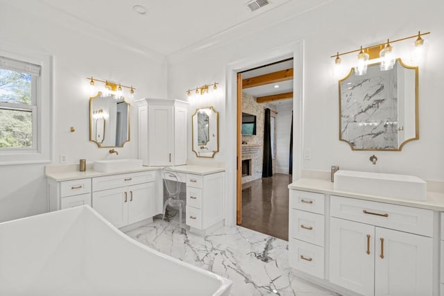 441 Pumpkinvine Rd, Acworth, GA 30101 - full bath with marble finish floor, a fireplace, and a sink