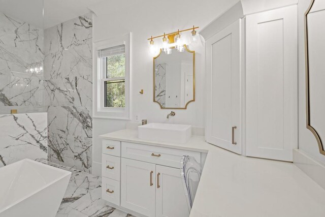 441 Pumpkinvine Rd, Acworth, GA 30101 - bathroom featuring vanity, a soaking tub, marble finish floor, and a marble finish shower