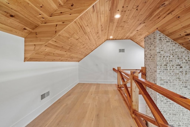 441 Pumpkinvine Rd, Acworth, GA 30101 - corridor with an upstairs landing, visible vents, baseboards, and wood finished floors