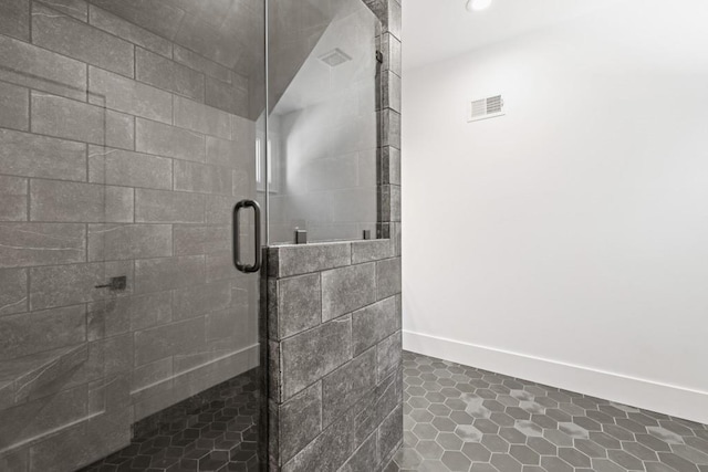 441 Pumpkinvine Rd, Acworth, GA 30101 - bathroom featuring visible vents, recessed lighting, a stall shower, and baseboards