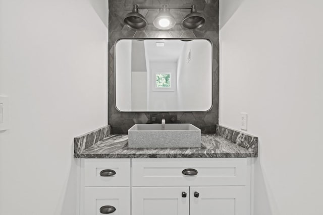 441 Pumpkinvine Rd, Acworth, GA 30101 - bathroom featuring vanity and backsplash