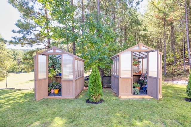 441 Pumpkinvine Rd, Acworth, GA 30101 - view of greenhouse featuring a lawn
