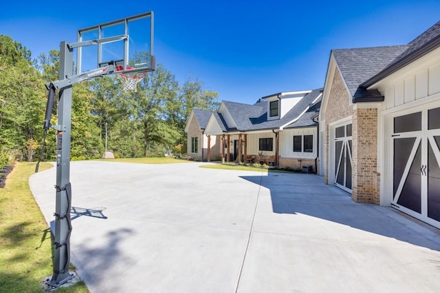 441 Pumpkinvine Rd, Acworth, GA 30101 - view of basketball court with a lawn