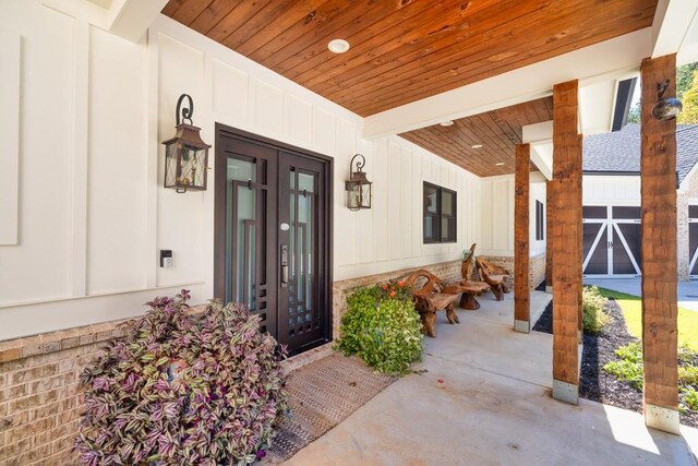441 Pumpkinvine Rd, Acworth, GA 30101 - doorway to property featuring board and batten siding