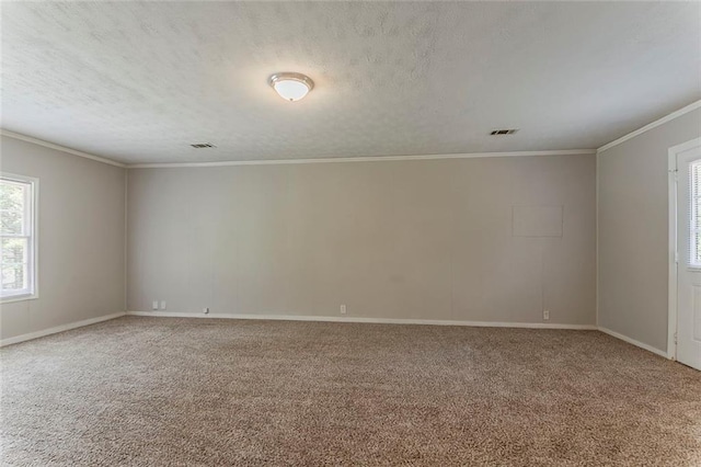 2783 Bicentennial Dr, Stone Mountain, GA 30087 - spare room featuring carpet floors, ornamental molding, and a textured ceiling