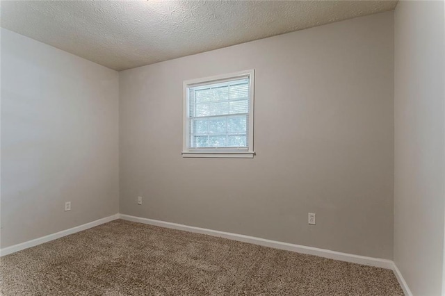 2783 Bicentennial Dr, Stone Mountain, GA 30087 - carpeted spare room featuring baseboards and a textured ceiling