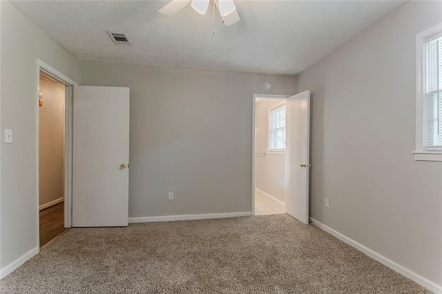 2783 Bicentennial Dr, Stone Mountain, GA 30087 - carpeted spare room featuring ceiling fan and baseboards