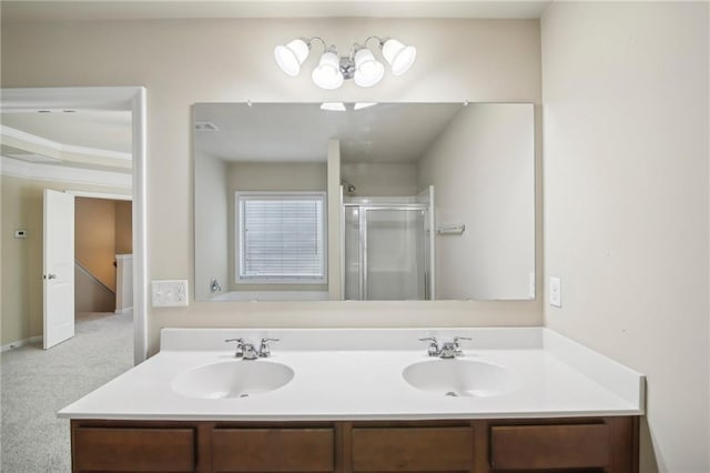 bathroom with double vanity, a sink, and a shower stall