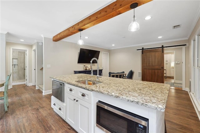 kitchen with stainless steel microwave, dark wood-style flooring, a sink, beam ceiling, and visible vents