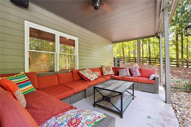 view of patio with outdoor lounge area and fence