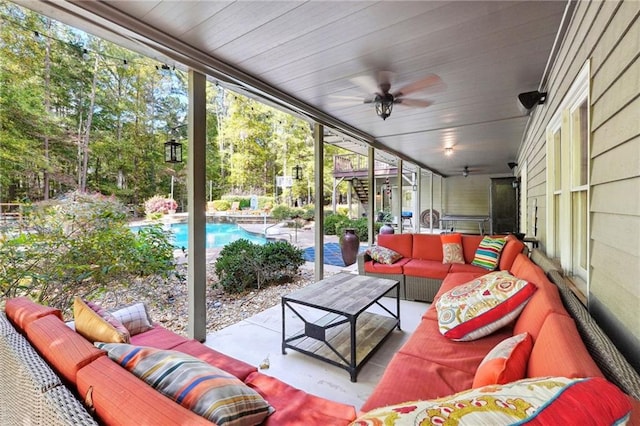 exterior space featuring outdoor lounge area and ceiling fan