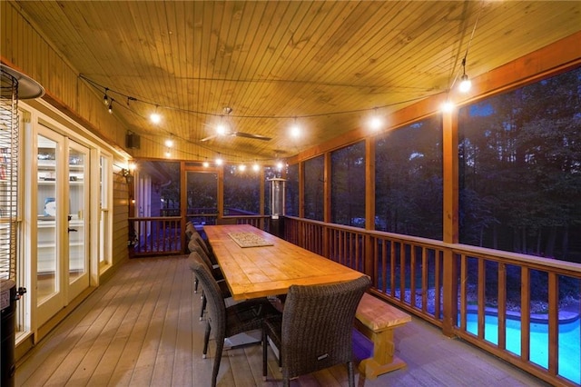 sunroom / solarium with rail lighting