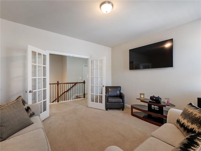 carpeted living room featuring french doors