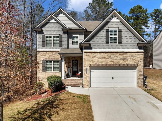 craftsman-style house featuring concrete driveway and a garage