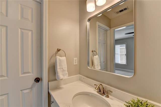 bathroom featuring visible vents and vanity