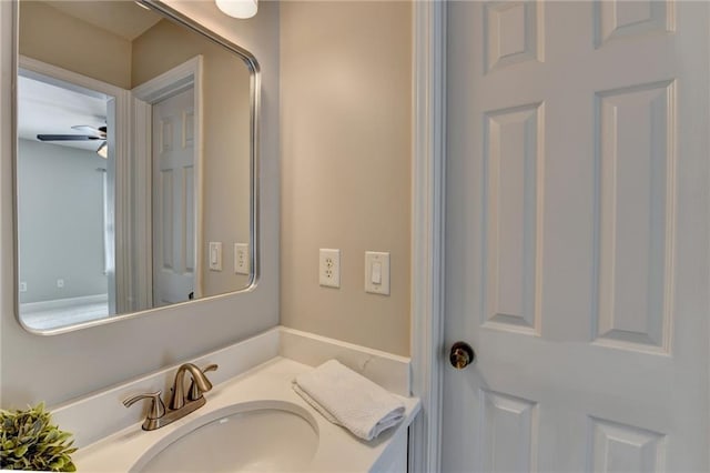 bathroom with vanity and ceiling fan