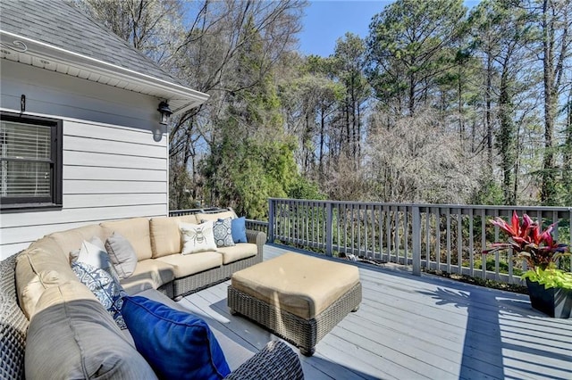 wooden deck with an outdoor hangout area