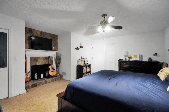 carpeted bedroom with lofted ceiling and a textured ceiling