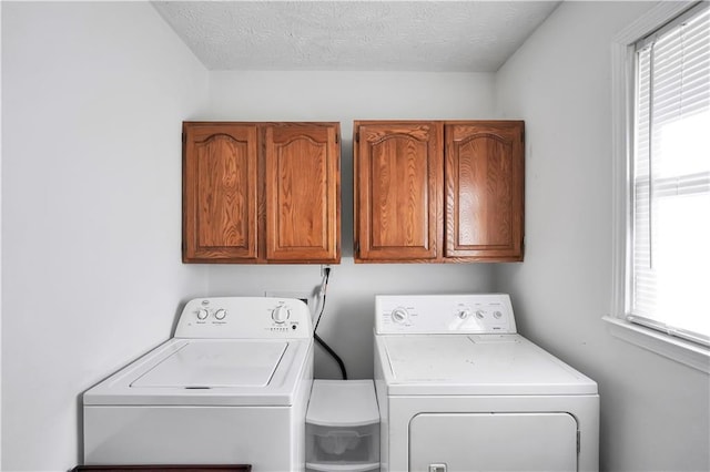 bathroom featuring vanity, toilet, and a textured ceiling