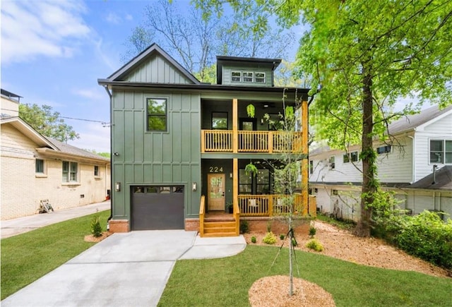 224 Cambridge Ave, Decatur, GA 30030 - view of front of home featuring board and batten siding, driveway, a balcony, a porch, and an attached garage