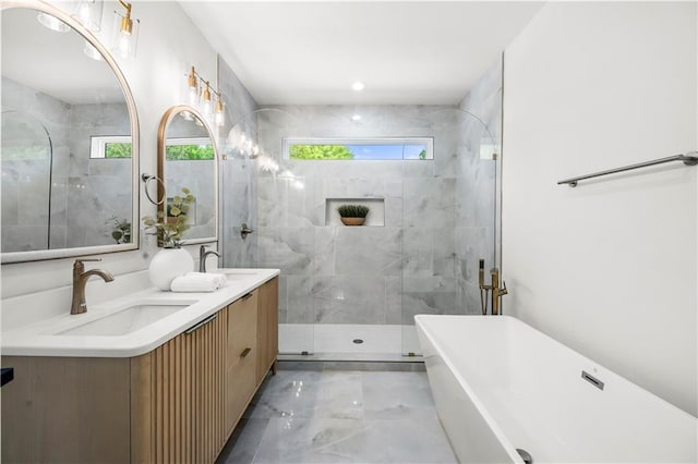 224 Cambridge Ave, Decatur, GA 30030 - bathroom featuring marble tiled floors, a soaking tub, double vanity, and a stall shower