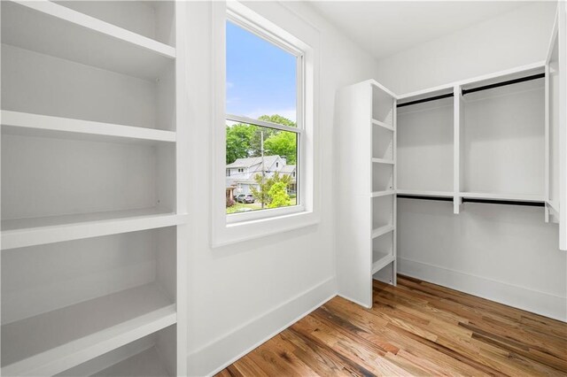 224 Cambridge Ave, Decatur, GA 30030 - bedroom featuring baseboards, a raised ceiling, light wood finished floors, and a ceiling fan
