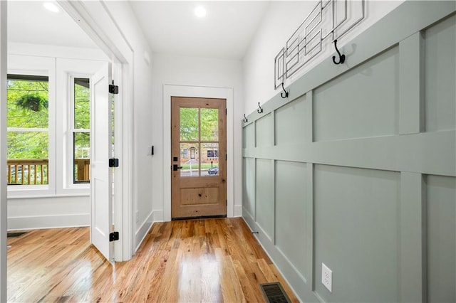 224 Cambridge Ave, Decatur, GA 30030 - doorway with light wood-type flooring, recessed lighting, and baseboards