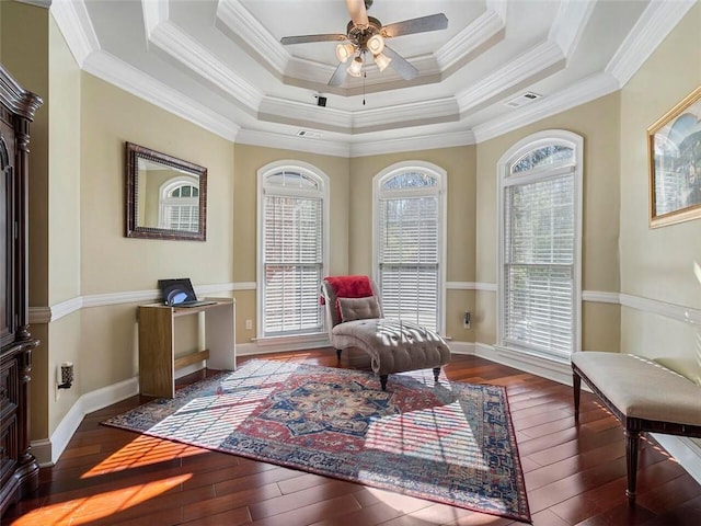 sitting room with crown molding, hardwood / wood-style floors, and ceiling fan