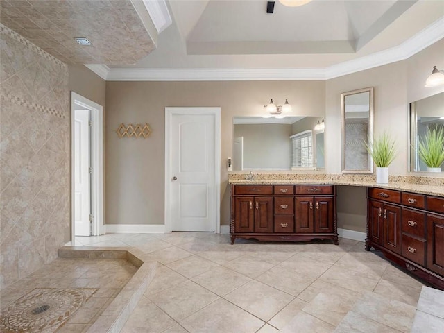 bathroom with vanity, tile walls, crown molding, and tile patterned flooring