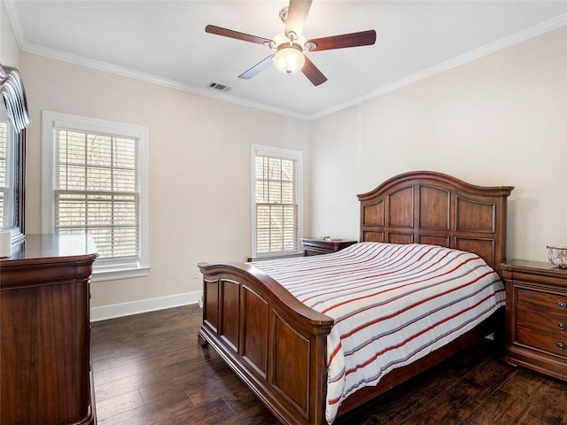 bedroom featuring dark hardwood / wood-style floors, crown molding, multiple windows, and ceiling fan