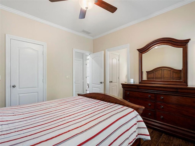 bedroom with ornamental molding, ceiling fan, and dark hardwood / wood-style floors