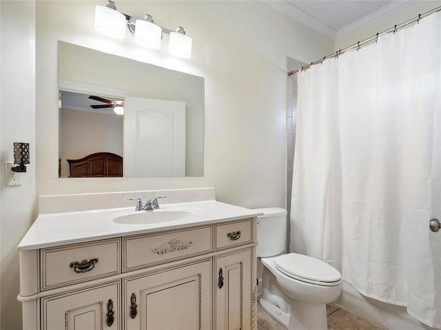 bathroom featuring ceiling fan, vanity, ornamental molding, tile patterned floors, and toilet