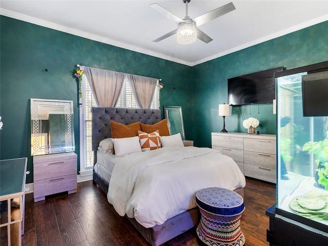 bedroom featuring crown molding, ceiling fan, and dark hardwood / wood-style floors