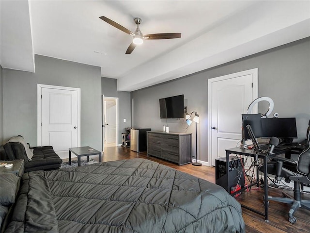 bedroom with ceiling fan and hardwood / wood-style floors