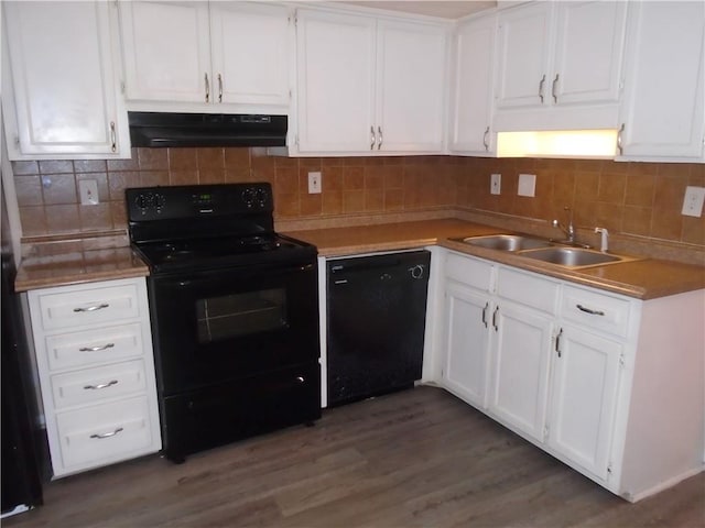 kitchen with sink, tasteful backsplash, black appliances, and white cabinetry