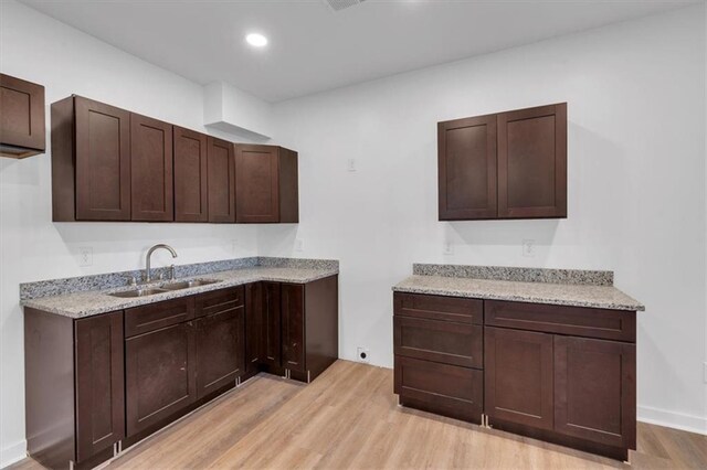 5361 N Main St, Acworth, GA 30101 - bar with light wood-style flooring, a sink, and recessed lighting