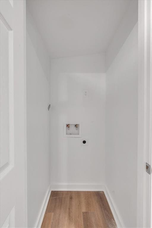 laundry area with hookup for an electric dryer, wood-type flooring, and washer hookup