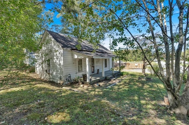 exterior space featuring a front lawn