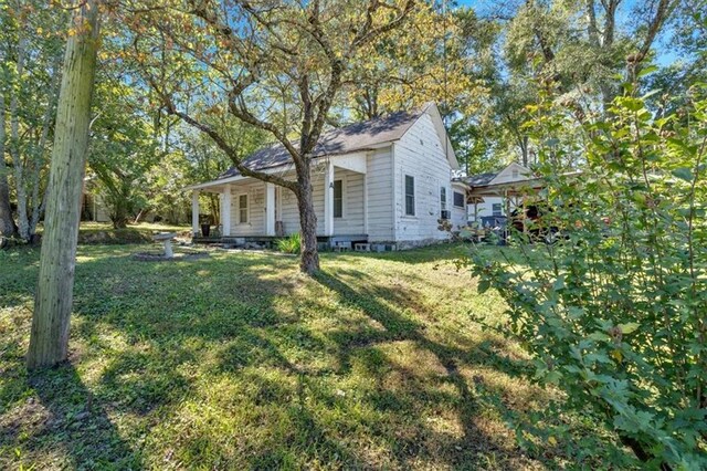 5361 N Main St, Acworth, GA 30101 - view of side of property with covered porch and a lawn