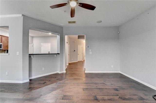 3351 Vintage Cir SE, Smyrna, GA 30080 - spare room featuring ceiling fan, wood finished floors, and baseboards